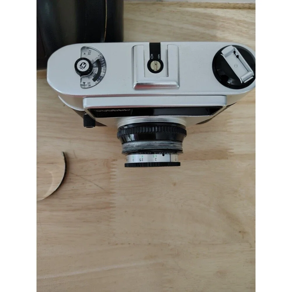 Regula Sprinty Camera with Rexar 45mm f/2.8 Lens and nice leather case read des